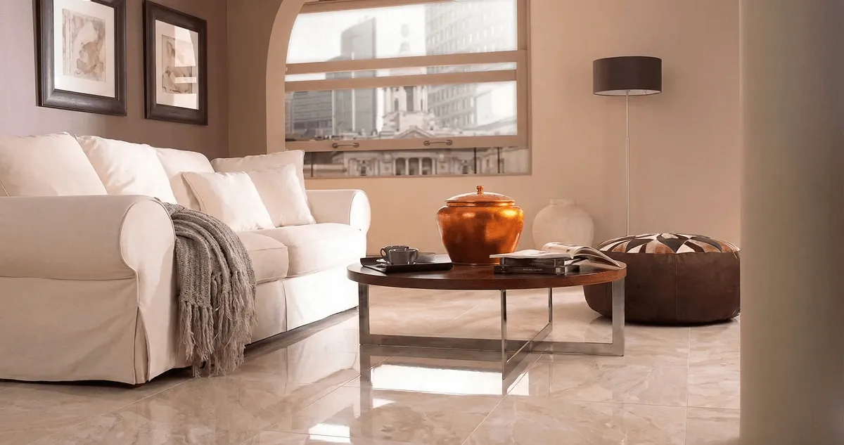 Modern living room with professionally installed marble flooring, a beige sofa, coffee table in Phoenix, AZ